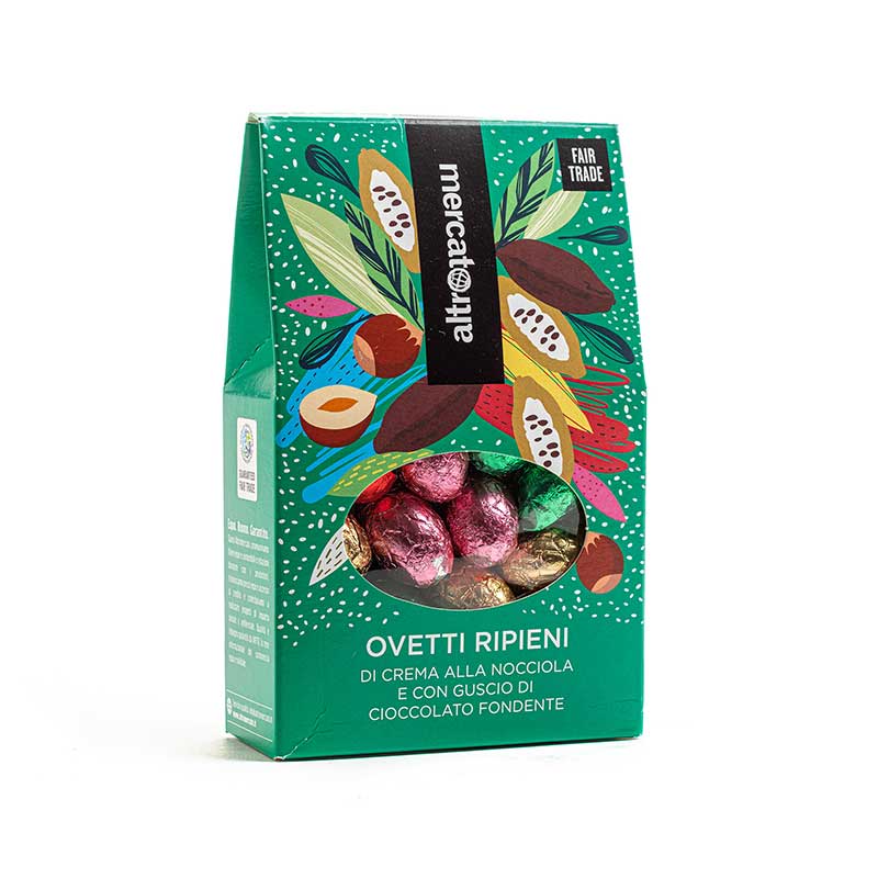 Ovetti di cioccolato fondente ripieni di crema alla nocciola. Prodotti da Altromercato con i migliori cioccolati